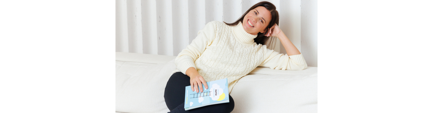 InClouds. Journal creator and founder, Tina Vlasic, holding brand new InClouds. Journal in her hands